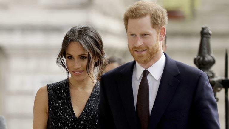 Britain's Prince Harry and his fiancee Meghan Markle will be married this Saturday, and you can easily catch it on TV. (Matt Dunham/AP)