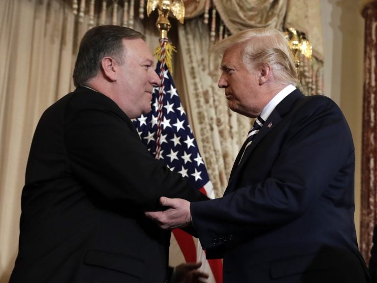 President Donald Trump participates in a ceremonial swearing-in for Secretary of State Mike Pompeo at the State Department on May 2. (Evan Vucci/AP)