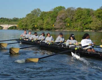 The Philly Council Dad Vail crew during practice on the Schuylkill Wednesday morning (Tom MacDonald/WHYY)