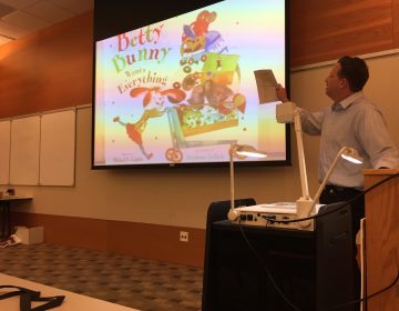 Todd Zartman gives his 'Kiddynomics' presentation.