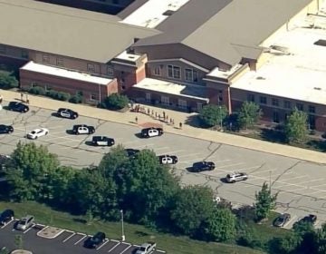 Two people were injured in a shooting at a suburban Indianapolis middle school. The suspect is in custody. (WRTV) 