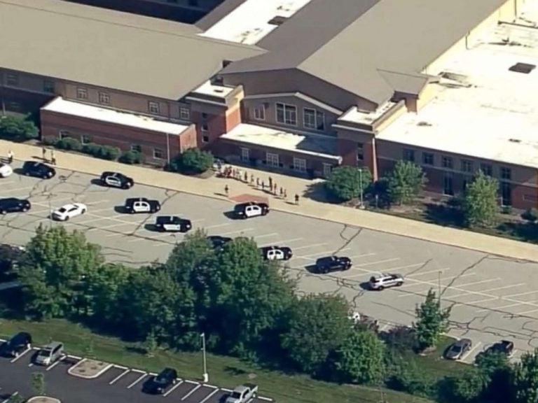 Two people were injured in a shooting at a suburban Indianapolis middle school. The suspect is in custody. (WRTV) 