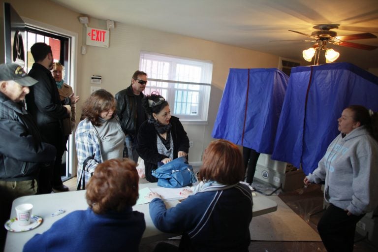 People cast their votes at a polling location in South Philadelphia.  (AP File Photo/ Joseph Kaczmarek)