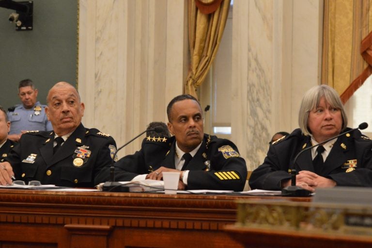 Philadelphia Police Commissioner Richard Ross (center) and deputies at City Council hearing (Tom MacDonald/WHYY)