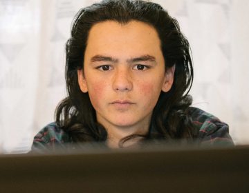 Sam Oozevaseuk Schimmel, 18, has grown up in both Alaska and Washington state. He is an advocate for Native Alaskan youth. (Kiliii Yuyan for NPR)