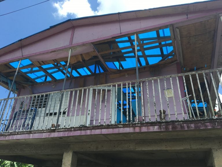 Rafaela Serrano's house in the municipality of Caguas is still roofless eight months after Hurricane Maria. Countless homes on the island remain damaged two weeks before the start of the next hurricane season. (Adrian Florido/NPR)