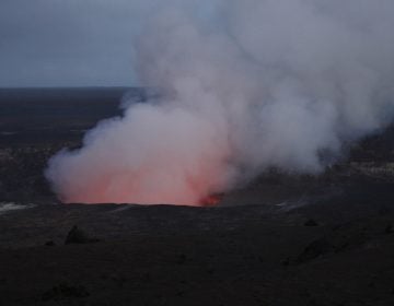 Steam and gas rise from Kilauea's summit crater in Volcanoes National Park, Hawaii. Wednesday, May 9, 2018. Geologists warned Wednesday that Hawaii's Kilauea volcano could erupt explosively and send boulders, rocks and ash into the air around its summit in the coming weeks. (AP Photo/Jae C. Hong)