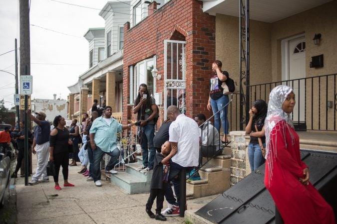 Community members gather to rally to bring justice for the death of Sandrea WIlliams three weeks after she was shot to death and two other teenage boys were shot outside of her mother’s home in West Philadelphia on May 11th, 2018. (Emily Cohen for WHYY)