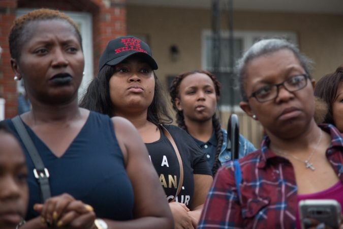 Community members gather to rally to bring justice for the death of Sandrea WIlliams three weeks after she was shot to death and two other teenage boys were shot outside of her mother’s home in West Philadelphia on May 11th, 2018. (Emily Cohen for WHYY)