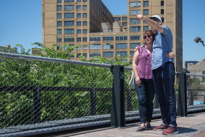 Philadelphians of all ages gather to inaugurate the first quarter mile of the Philadelphia Rail Park June 14th 2018. (Emily Cohen for WHYY)