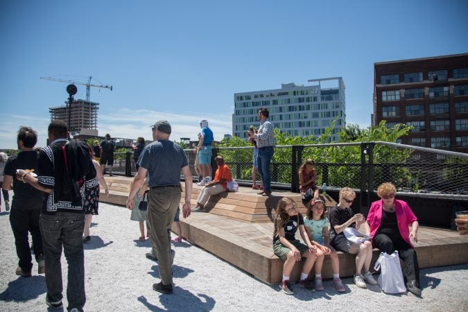 Philadelphians of all ages gather to inaugurate the first quarter mile of the Philadelphia Rail Park June 14th 2018. (Emily Cohen for WHYY)