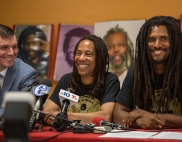 Debbie Africa sits with her lawyer, Brad Thomson (left), and her son Michael Africa Jr (right) as she makes her first public appearance since being released from prison after 39 years and 10 months of incarceration on June 19th 2018. (Emily Cohen for WHYY)