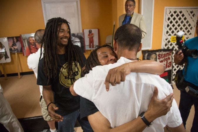 MOVE member Debbie Africa makes her first public appearance since being released from prison after 39 years and 10 months of incarceration. She hugs and greets members of the community who have come out to support her. (Emily Cohen for WHYY)