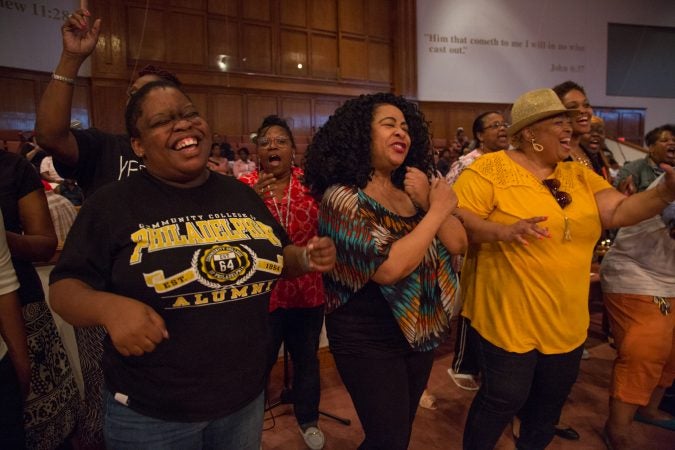 More than 100 faith singers and performers from across Philadelphia gather at Deliverance Evangelical Church in North Philadelphia on June 25 to rehearse for their gospel concert at Independence Hall as part of this year’s Wawa Welcome America celebration. (Emily Cohen for WHYY)