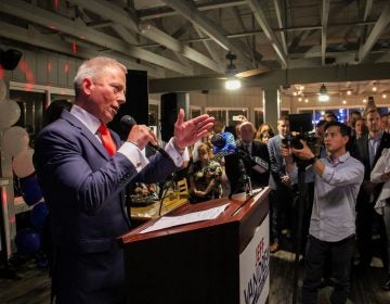 New Jersey state Sen. Jeff Van Drew addresses the crowd at the Lobster Loft in Sea Isle City after winning the Democratic nomination to run for the congressional seat vacated by Republican Frank LoBiondo. (Emma Lee/WHYY)
