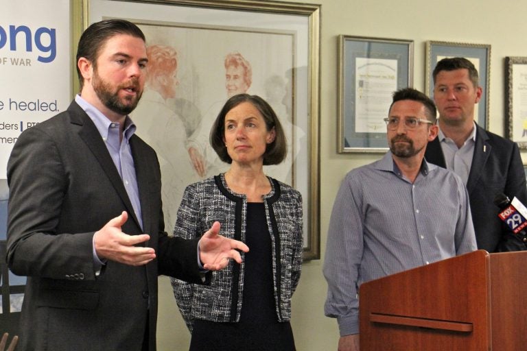 Joe Quinn (left), executive director of Headstrong, announces that the program that brings free mental health care to veterans and their families is coming to Philadelphia. He is joined by (from left) Deb D'Arcangelo, chief executive officer of Council for Relationships, Gerard Ilaria, clinical director of Headstrong, and former U.S. Army Secretary Patrick Murphy.
