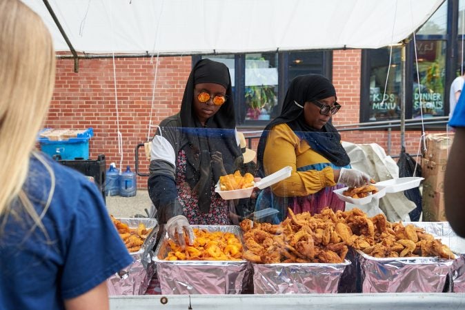 King Chefs serves fish, shrimp, and wings at the 2018 Odunde Festival. They have been a vendor at the festival since 1998. (Natalie Piserchio for WHYY News) 