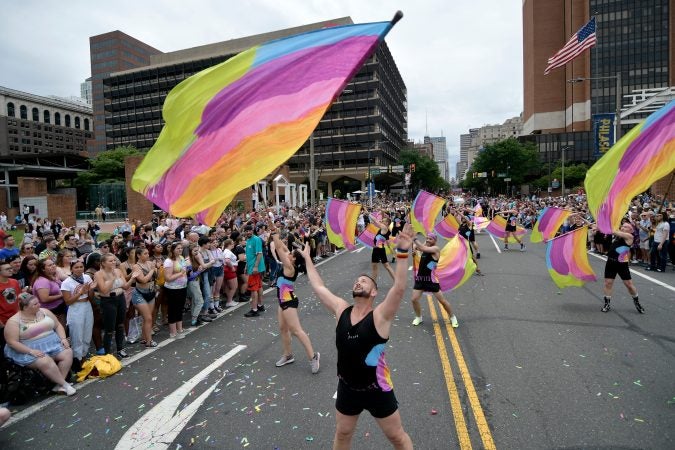 The Flagots of NYC perform for the judges at Independence Mall, during the 30th Philly Pride Parade, on Sunday. (Bastiaan Slabbers for WHYY)