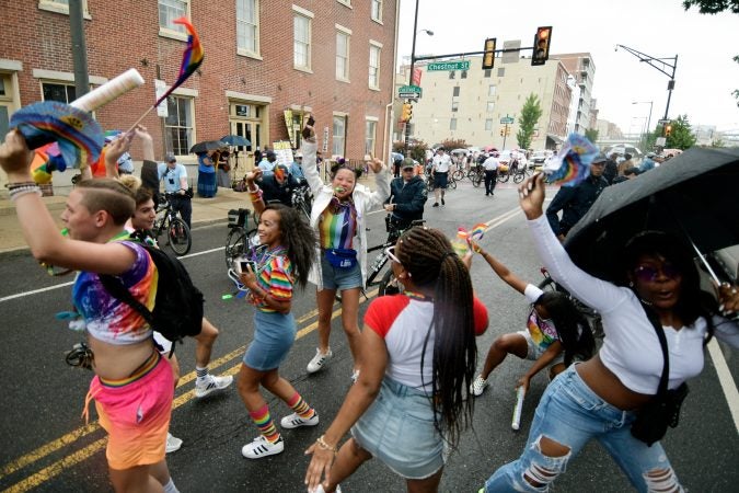 Near the end of the Philadelphia pride parade route, a large group of people gathers to counter-protest a man and his following on Sunday, June 10, 2018. (Bastiaan Slabbers for WHYY)