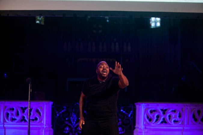 Khalil A.M.R Munir, a singer, dancer and instructor performs at Finding Sanctuary at Church of the Advocate in North Philadelphia. (Brad Larrison for WHYY)