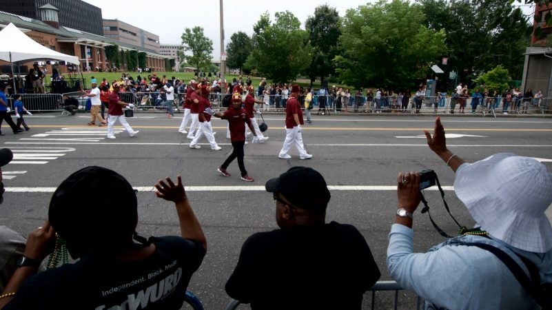 Juneteenth celebrators line the route for the annual Juneteenth parade at Independence Mall, on Saturday. (Bastiaan Slabbers for WHYY)