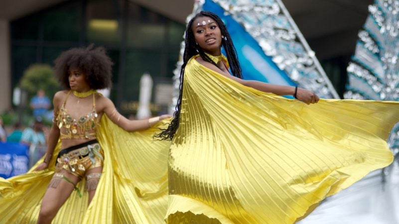 A Carnaval dance group from Trinidad performs during the Juneteenth Parade, in Center City, on Saturday. (Bastiaan Slabbers for WHYY)