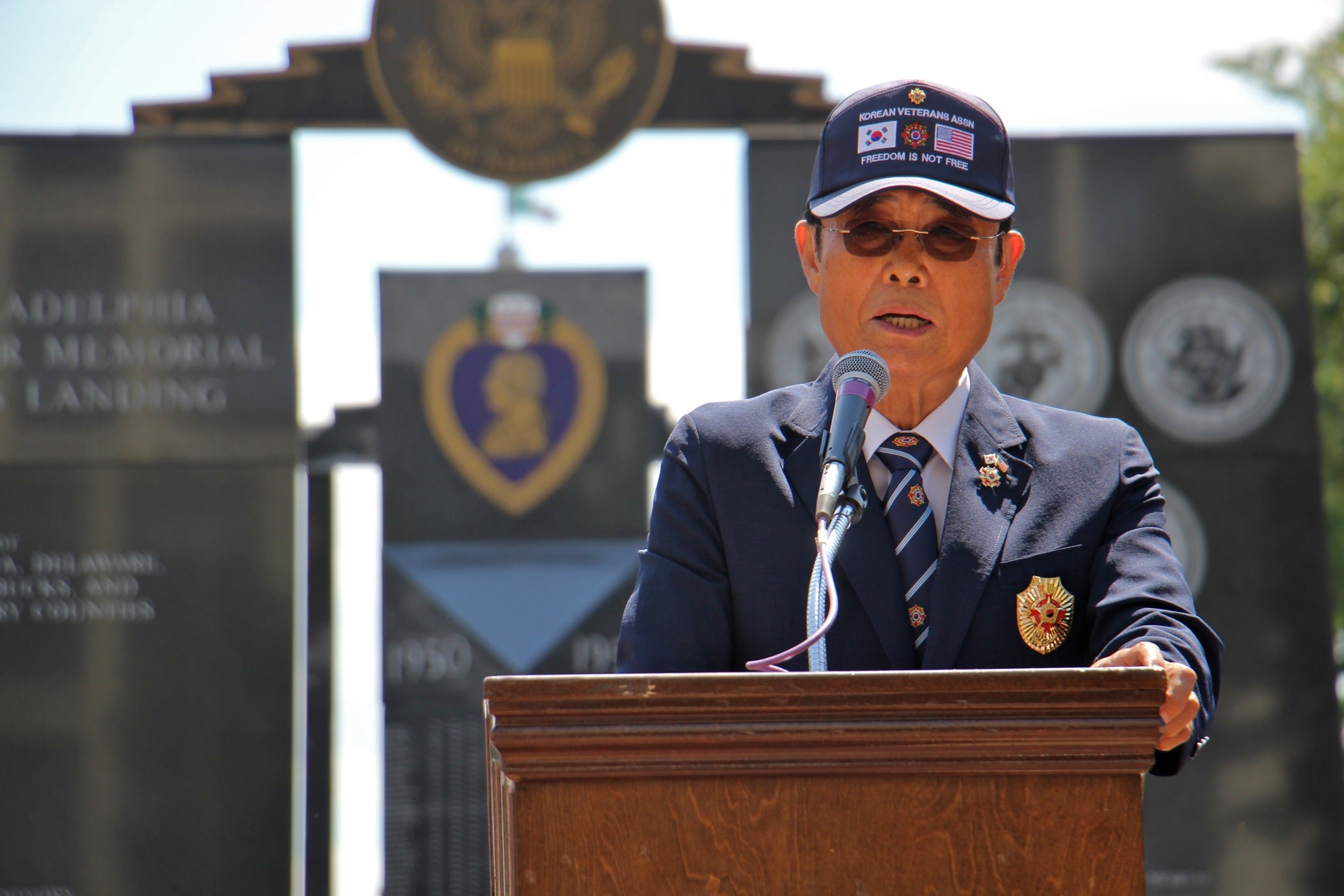 Oh Young Lee, president of the Korean Veterans Association of the Philadelphia Region, speaks at the Korean War Memorial Ceremony at Penn's Landing. 