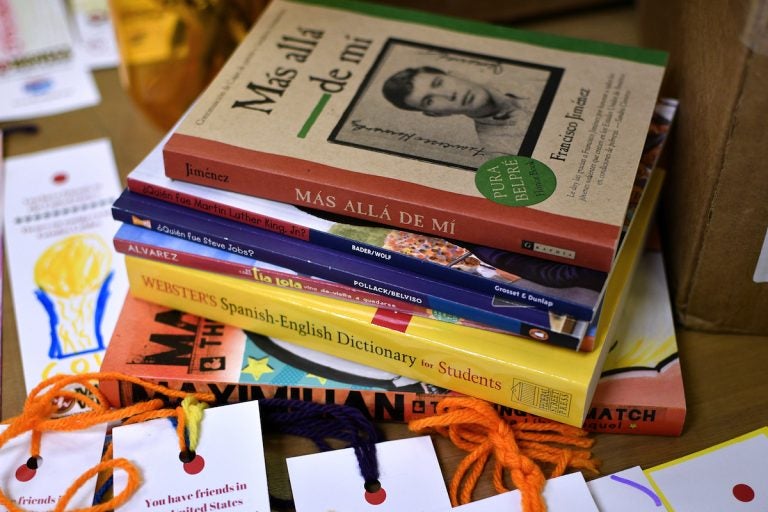 At Mighty Writers El Futuro in South Philadelphia, children donate books and make bookmarks for kids and immigrant families held at the Berks County Detention Center. (Bastiaan Slabbers for WHYY)