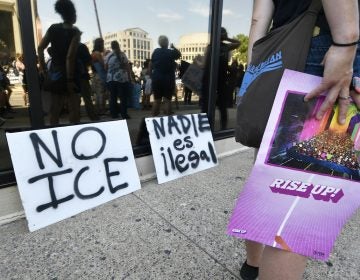 Protesters rally at the U.S. Immigration and Customs Enforcement field office at 8th and Cherry streets after a rally in Philadelphia on June 30. (Bastiaan Slabbers for WHYY)