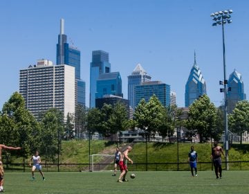 As the World Cup tournament began in Russia on June 14, 2018, some Philadelphians took advantage of a glorious day to play a game in Penn Park. (Brad Larrison for WHYY)