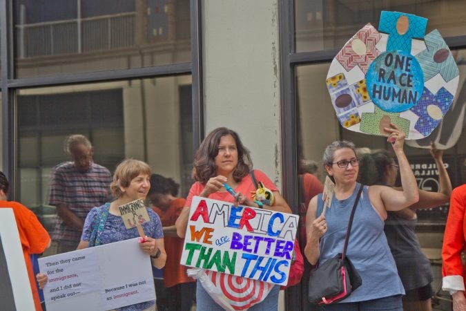 The ACLU and human rights groups rallied outside of the Center City offices of ICE in Philadelphia to protest the practice of separating children from their families. (Kimberly Paynter/WHYY)