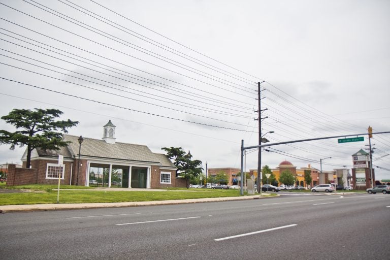 A gate is all the remains of the the Garden State Park Racetrack in Cherry Hill, N.J. The site has been redeveloped into a complex of shops, restaurants, and housing. (Kimberly Paynter/WHYY)