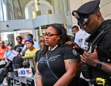 Officer Wilson’s sister Shak’ra Wilson-Burroughs told the press she is disgusted with the plea deal for her brother’s killers. (Kimberly Paynter/WHYY)