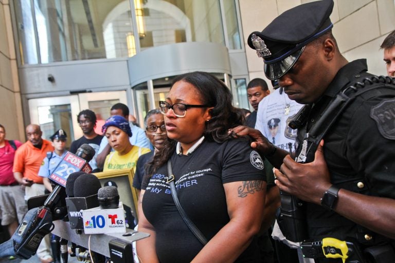 Officer Wilson’s sister Shak’ra Wilson-Burroughs told the press she is disgusted with the plea deal for her brother’s killers. (Kimberly Paynter/WHYY)