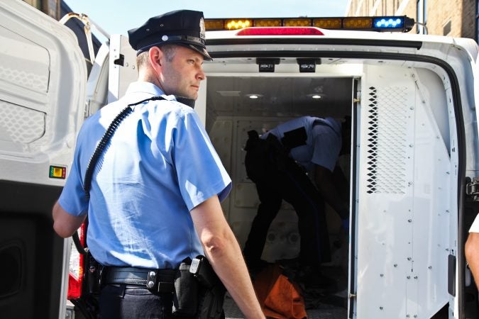 A senior citizen's group called The Old Farts were arrested in front of Philadelphia’s ICE headquarters Friday morning in protest of the Trump administration’s family separation policy. (Kimberly Paynter/WHYY)