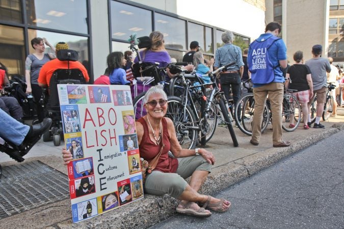 A senior citizen's group called The Old Farts were arrested in front of Philadelphia’s ICE headquarters Friday morning in protest of the Trump administration’s family separation policy. (Kimberly Paynter/WHYY)