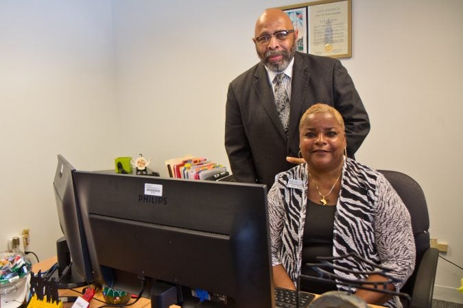 Michael Joynes is vice president of government and community relations at Philadelphia Works, and Nicki Woods is PA CareerLink administrator. (Kimberly Paynter/WHYY)