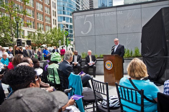Philadelphia Mayor Jim Kenney speaks at a memorial is dedication honoring six people who were killed in a building collapse five years ago. (Kimberly Paynter/WHYY)