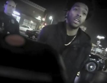 This Jan. 26, 2018 police body-camera footage released by Milwaukee Police Department shows NBA Bucks guard Sterling Brown as he talks to arresting police officers after being shot by a stun gun in a Walgreens parking lot in Milwaukee.