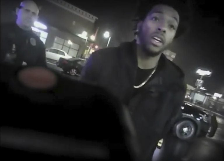 This Jan. 26, 2018 police body-camera footage released by Milwaukee Police Department shows NBA Bucks guard Sterling Brown as he talks to arresting police officers after being shot by a stun gun in a Walgreens parking lot in Milwaukee.