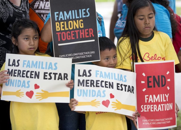 A group of children hold up signs during a demonstration in front of the Immigration and Customs Enforcement (ICE) offices, Friday, June 1, 2018, in Miramar, Fla. The children were taking part in the Families Belong Together Day of Action, where demonstrators in cities across the U.S. protested against separating immigrant children from their families. (Wilfredo Lee/AP Photo)