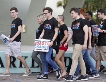 A group of Marjory Stoneman Douglas High School students arrive for a news conference, Monday, June 4, 2018, in Parkland, Fla. A day after graduating from high school, the group of Florida school shooting survivors has announced a multistate bus tour to 