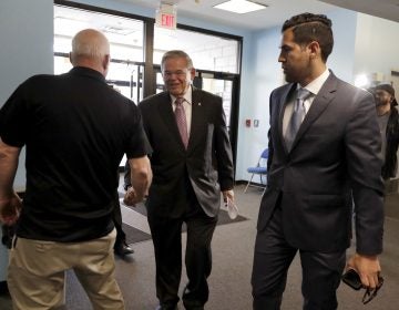 U.S. Sen. Bob Menendez is greeted by a poll worker as he arrives at the Harrison Community Center to cast his vote in the New Jersey primary election Tuesday, June 5, 2018, in Harrison, N.J. (Julio Cortez/AP Photo)