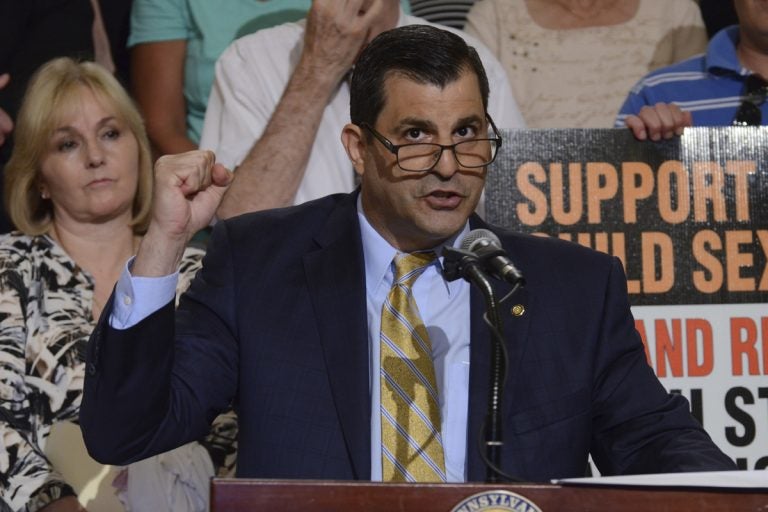 Rep. Mark Rozzi, D-Berks, speaks at a rally in Pennsylvania's Capitol to support legislation he has written to lift time limits for authorities to pursue charges of child sexual abuse, Tuesday, June 12, 2018 in Harrisburg, Pa. (AP Photo/Marc Levy)