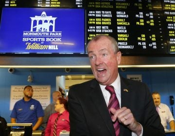 New Jersey Governor Phil Murphy, arrives to make the first wager with Monmouth Park Sports Book at Monmouth Park Racetrack. Thursday, June 14, 2018 in Oceanport, NJ. (Noah K. Murray/AP Photo)