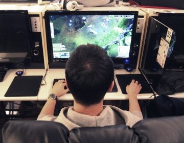 In this Wednesday, Dec. 11, 2013 file photo, a college student plays a computer game at an Internet cafe in Seoul, South Korea. On Monday, June 18, 2018, the World Health Organization said that compulsively playing video games now qualifies as a mental health condition. (Ahn Young-Joon/AP Photo)