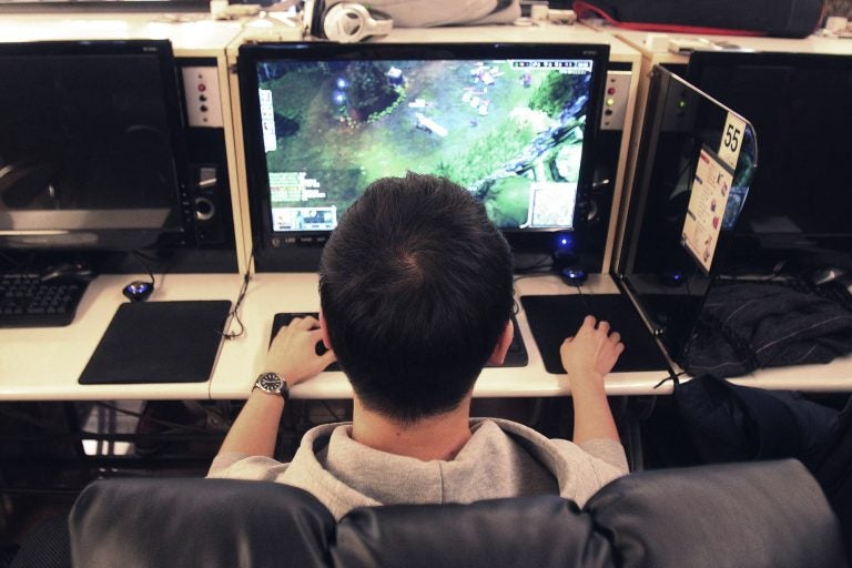 In this Wednesday, Dec. 11, 2013 file photo, a college student plays a computer game at an Internet cafe in Seoul, South Korea. On Monday, June 18, 2018, the World Health Organization said that compulsively playing video games now qualifies as a mental health condition. (Ahn Young-Joon/AP Photo)