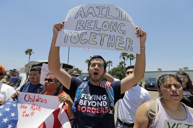 Kristopher Coca yells during a protest outside the U.S. Border Patrol Central Processing Center Saturday, June 23, 2018, in McAllen, Texas. The protest occurred amid an uproar over the Trump administration's practice of separating immigrant families caught on the southwest border. President Donald Trump signed an order this week to keep families detained together during immigration proceedings. (AP Photo/David J. Phillip)