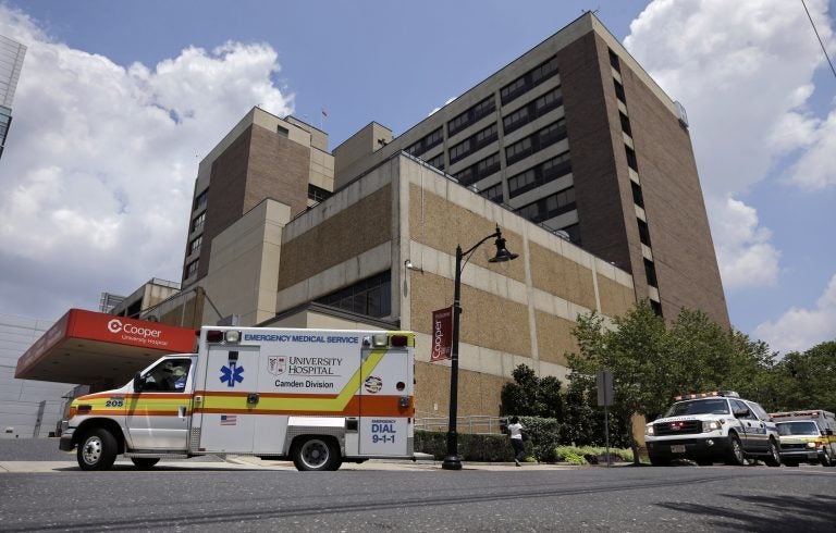 University Hospital, Camden Division, ambulances and emergency trucks rush to the emergency room at Cooper University Hospital