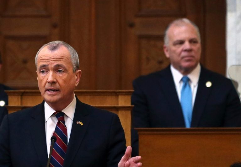 Senate President Steve Sweeney, (right), D-Gloucester, listens as New Jersey Gov. Phil Murphy speaks in the Assembly chamber of the Statehouse in Trenton. (Mel Evans/AP Photo, File)